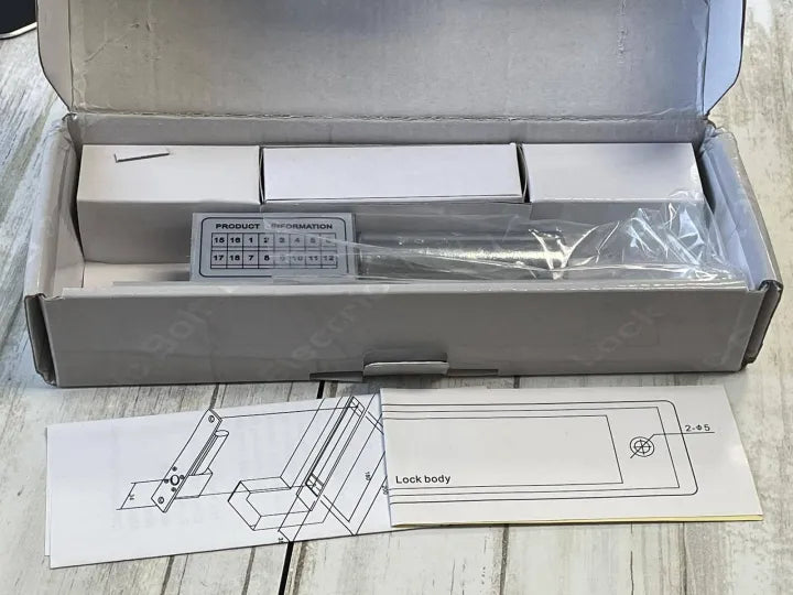 Contents of the Electric Bolt Lock package, with an instruction manual and components.