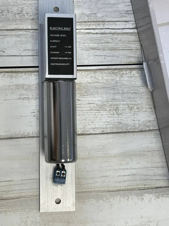 Detail of the Electric Bolt Lock showing voltage, current, and continuous duty specifications.

