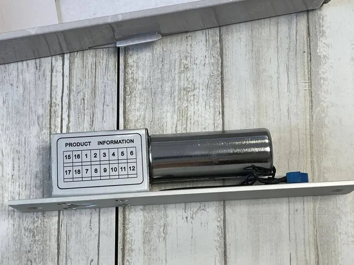 Side view of the Electric Bolt Lock with product information label and wiring connection.

