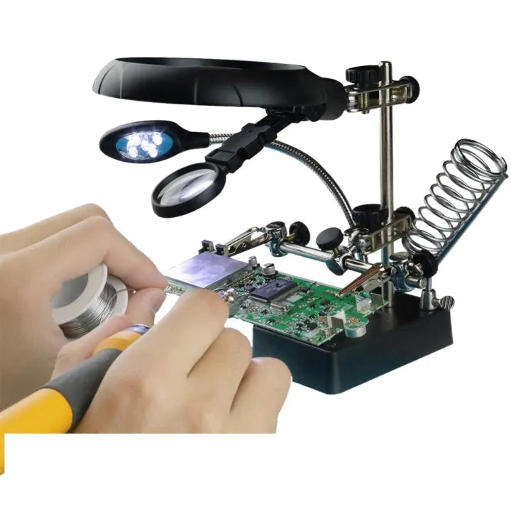 Person soldering a circuit board with the help of soldering magnifying glass stand  and soldering iron on a white background