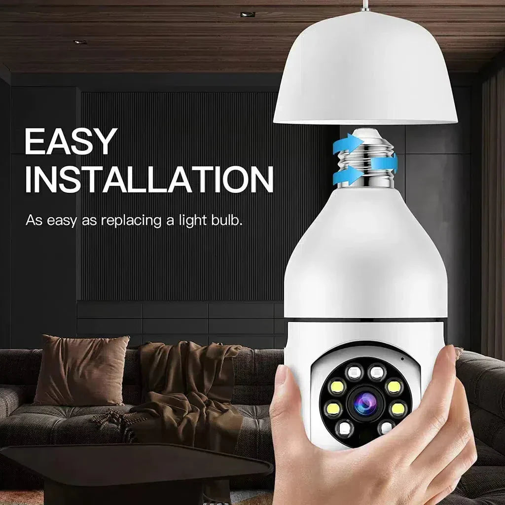 Smart security camera being held in front of a light bulb with text 'Easy Installation' in a living room setting.