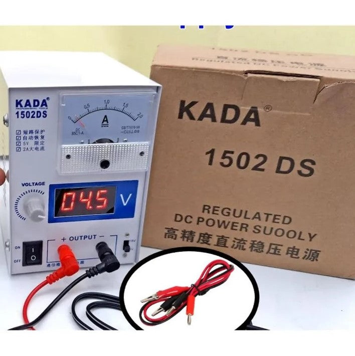 The Kada 1502DS adjustable DC power supply with its retail box and included red and black alligator clip testing leads.